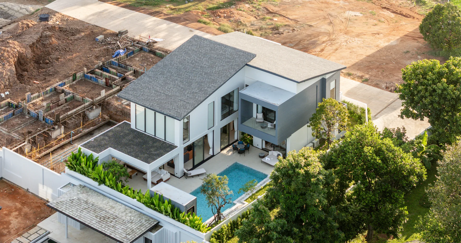 Apella Estate aerial view of villa with pool